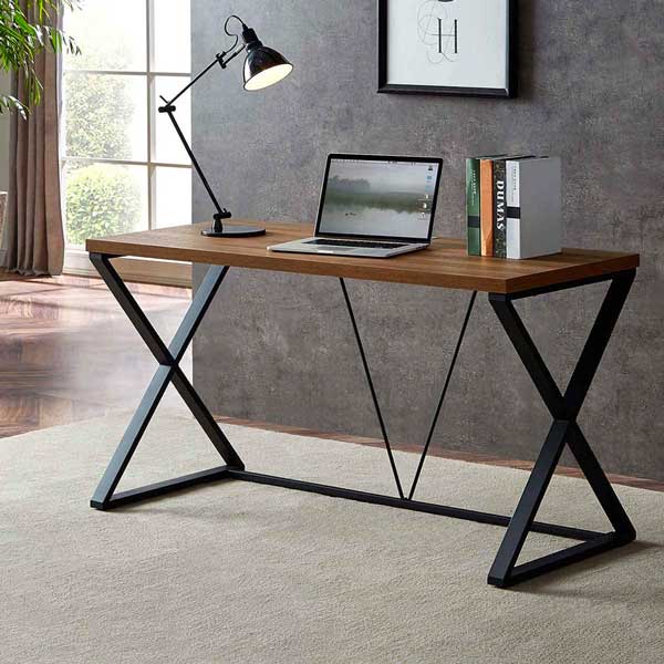 A wood and metal desk in a room