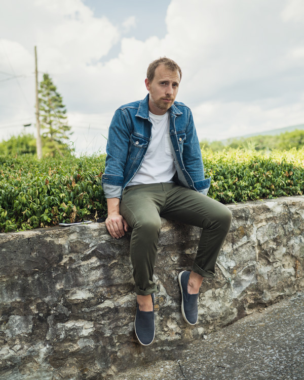 denim jacket with green chinos sneakers white t shirt