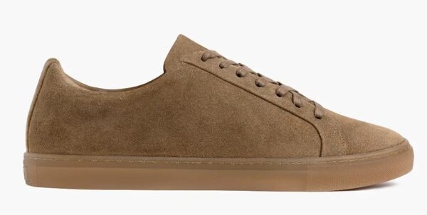 a low top sneaker with suede upper and gum sole