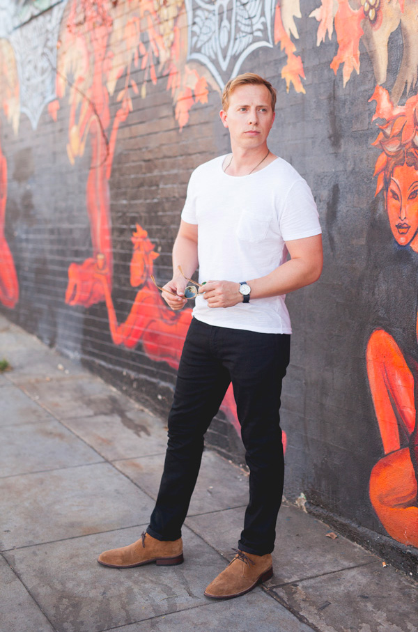 white pocket t shirt black jeans tan boots