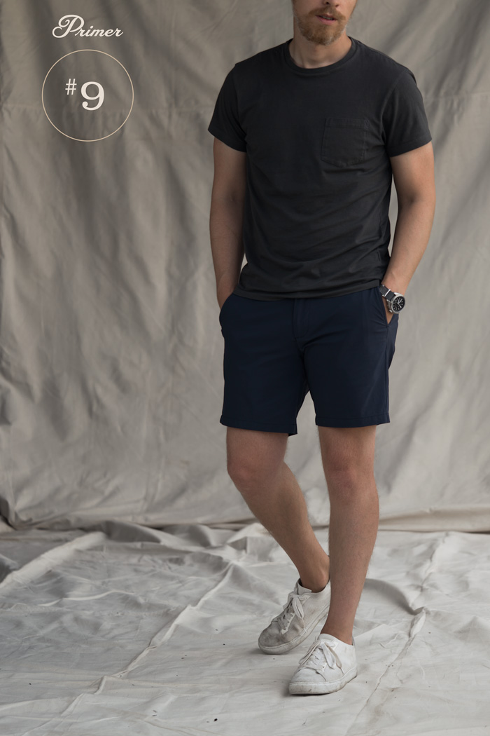 black t shirt blue shorts white sneakers men fashion