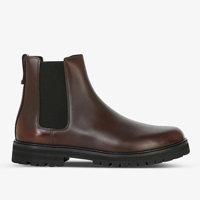A pair of brown chelsea boots