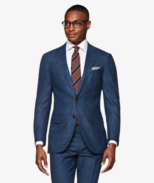 A man wearing a blue suit