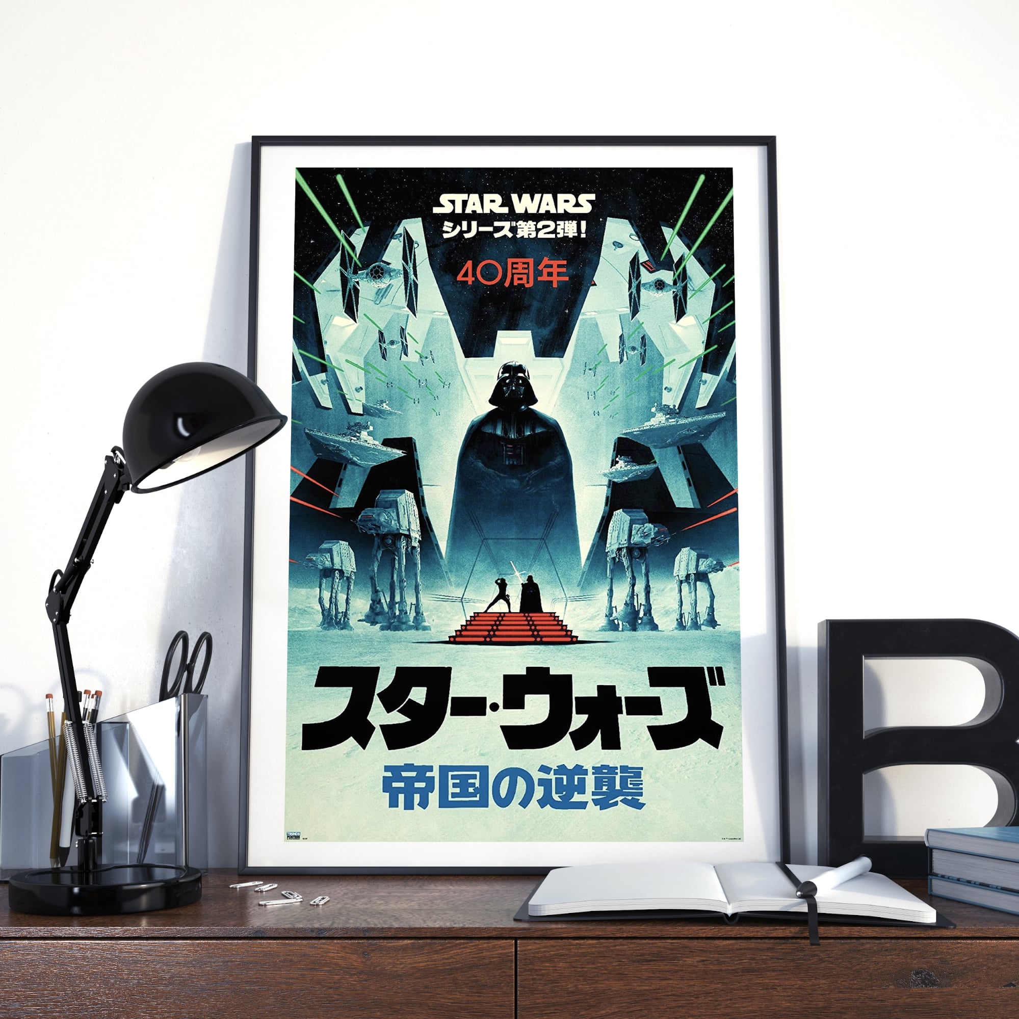 Image of Star Wars movie poster in a frame on a desk