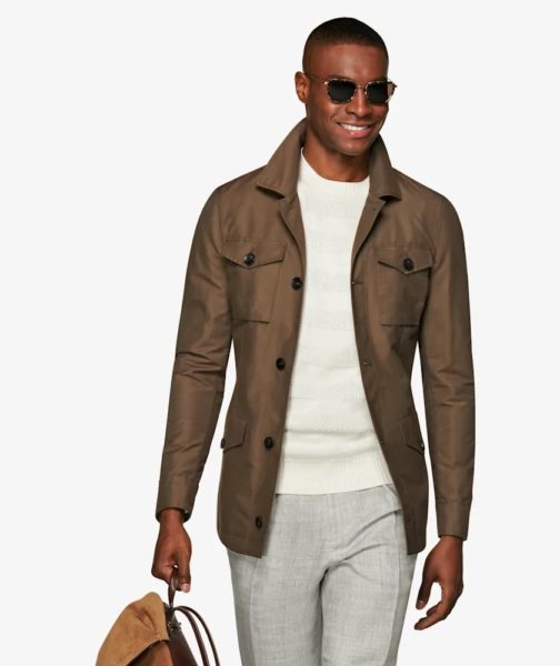 A man wearing a green field jacket