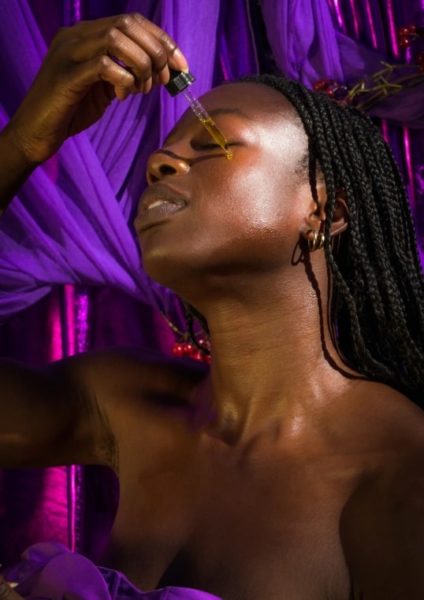 women using brujita skincare serum