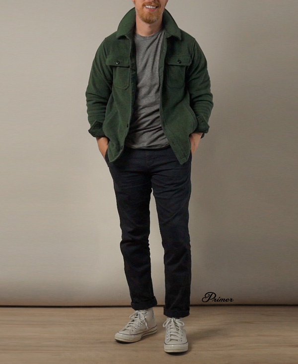 men's casual outfit idea with green fleece sweater jacket and blue chinos with converse sneakers