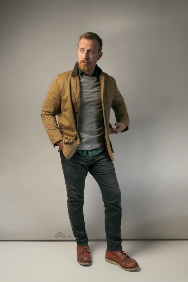 field-jacket-gray-sweatshirt-jeans-red-wing-boots rugged outfit inspiration: field jacket, gray sweatshirt, plaid shirt, gray jeans, red wings