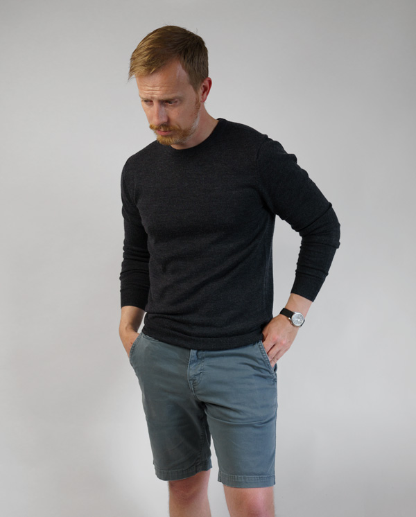 black merino wool sweater with blue shorts