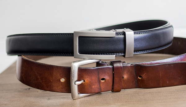 Anson belt next to a belt with worn holes