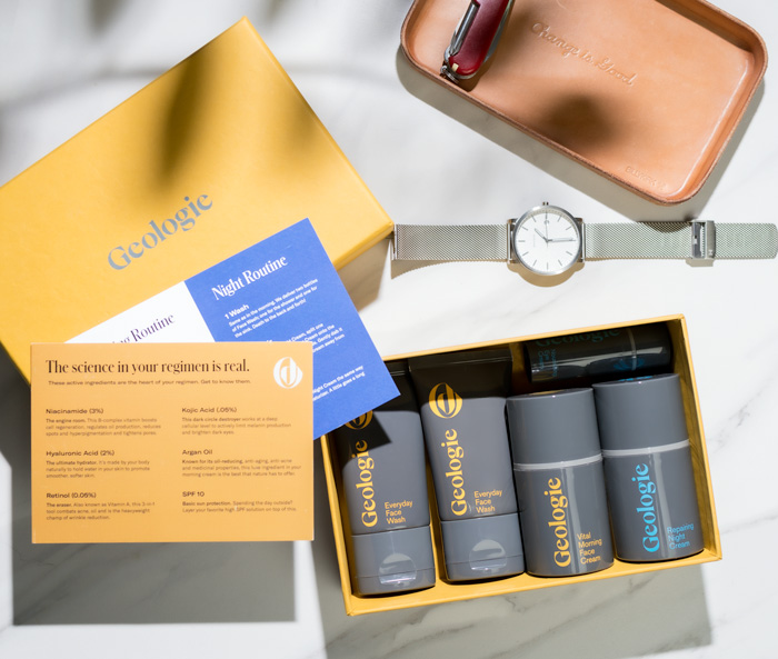 Geologie subscription box on table with watch and valet tray