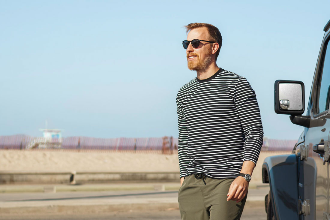 man wearing striped summer shirt