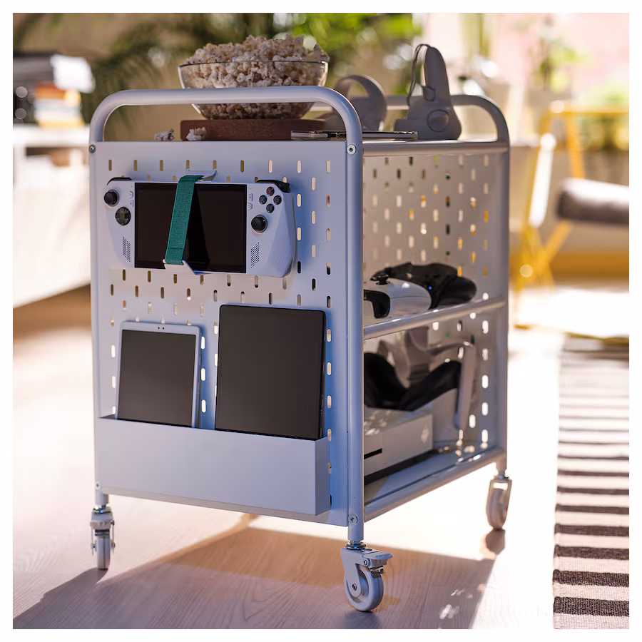 a metal shelving unit on casters