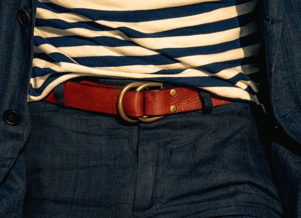 a close up of a leather belt from a casual suit outfit