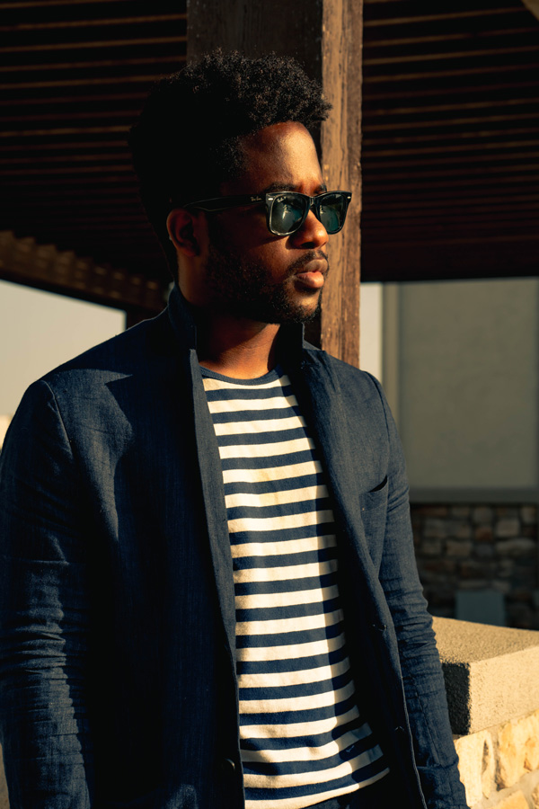 man wearing t-shirt with suit