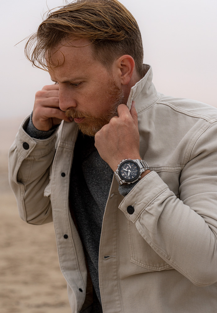 Metal G-Shock MT-G Watch with tan trucker jacket