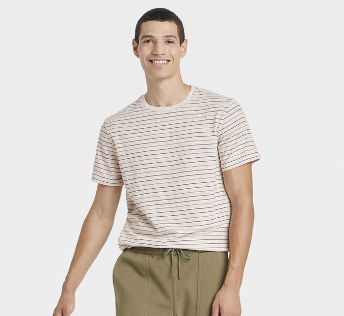 man wearing a striped short sleeve crewneck shirt