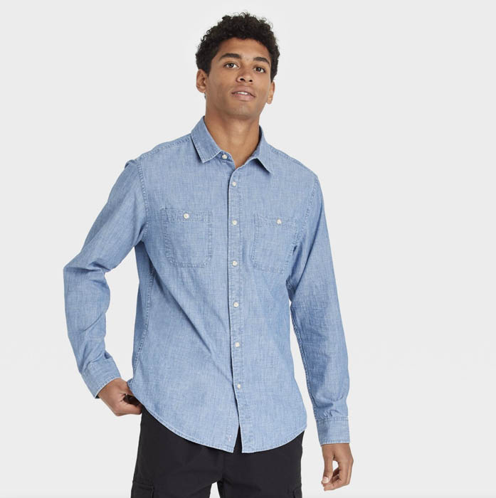 man wearing a light blue long sleeve button down shirt