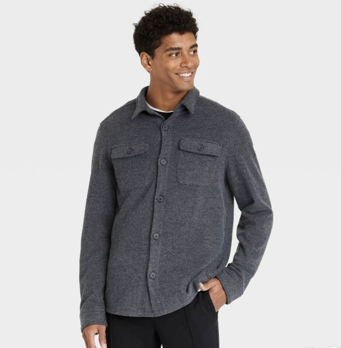man wearing a black canvas chore shirt jacket