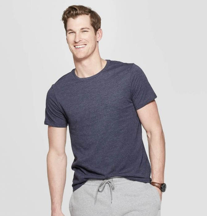 man wearing a blue short sleeve crew neck shirt