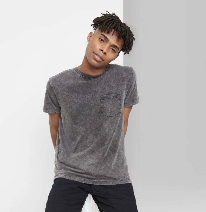 man wearing a grey short sleeve crewneck shirt