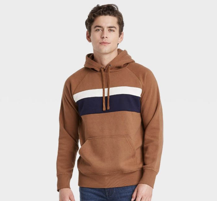 man wearing a brown cedar hooded sweatshirt