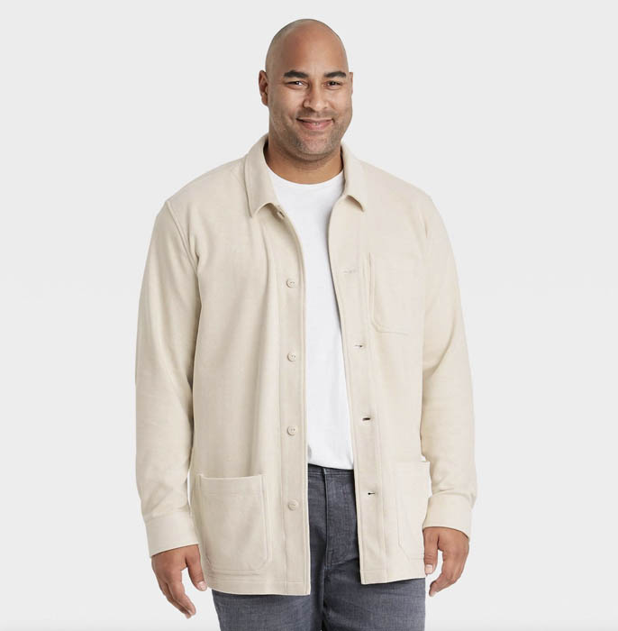 man wearing a light beige knit chore jacket