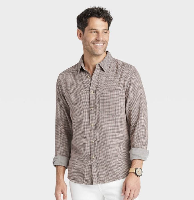 man wearing an orange pattern long sleeve button down shirt