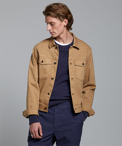 man wearing a brown twill jacket