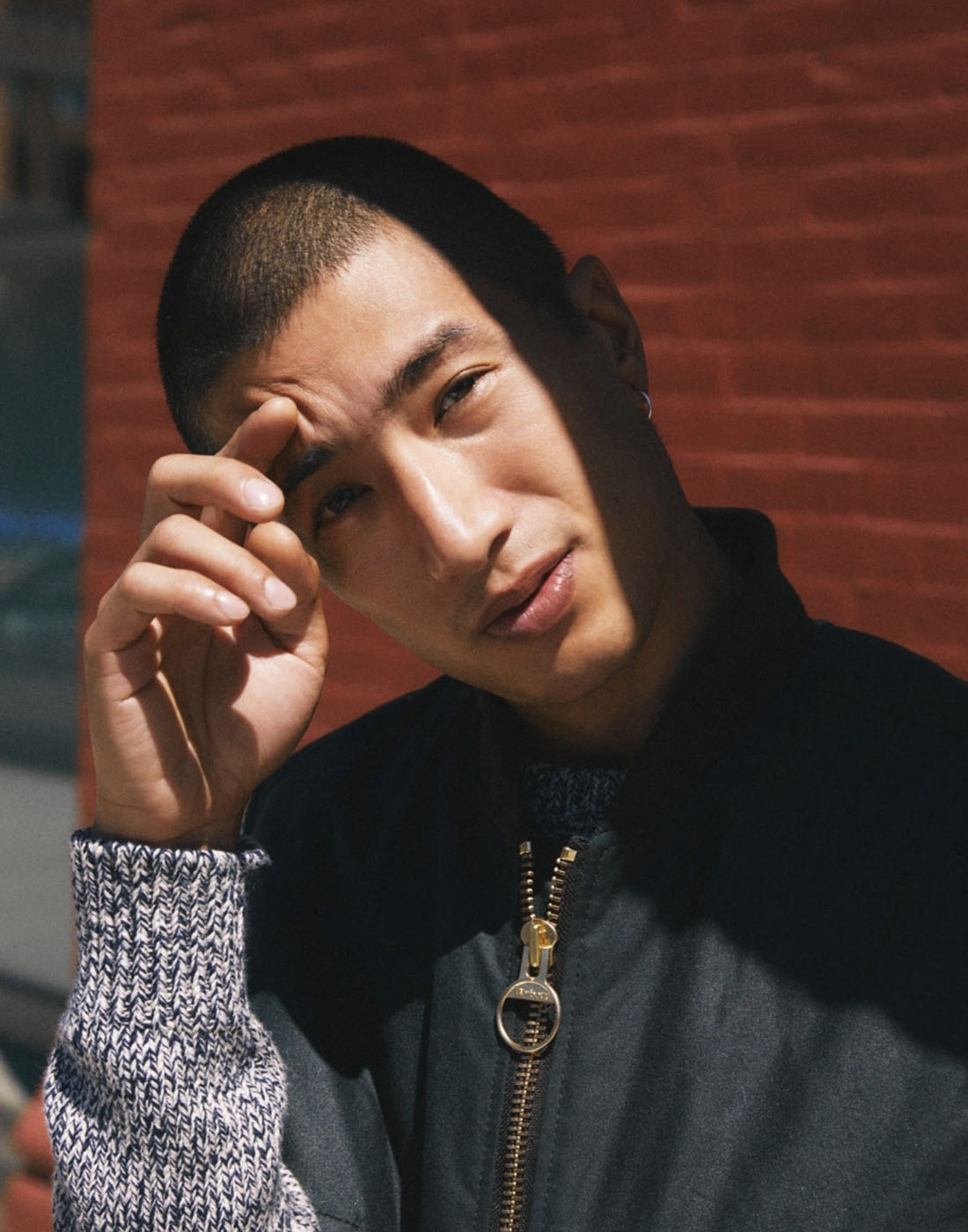 jcrew15 man touching his eyebrow