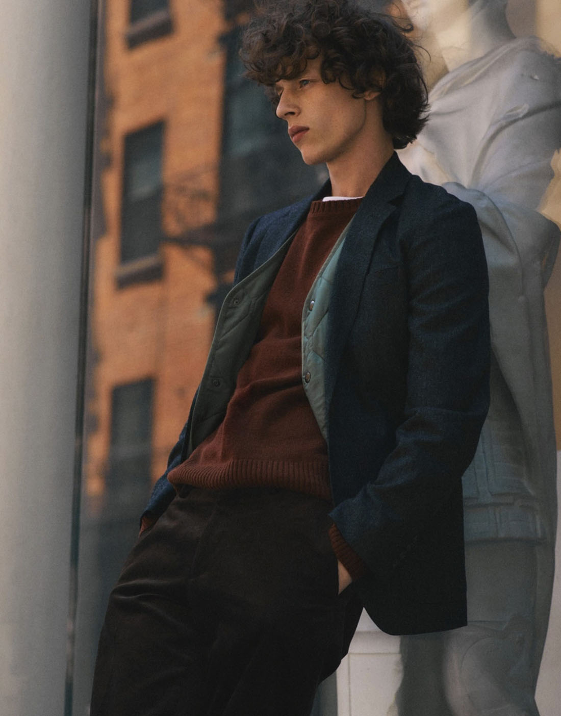 jcrew3 man wearing coat and brown sweater