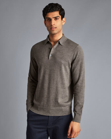 man wearing a long sleeve merino polo shirt