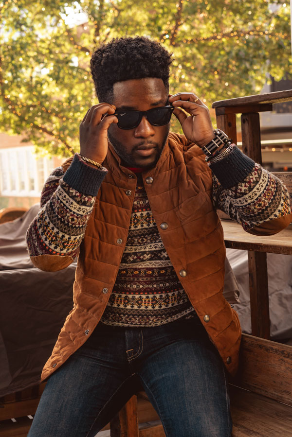 man wearing a fair isle style sweater