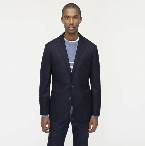 image of a man wearing a dark blue blazer