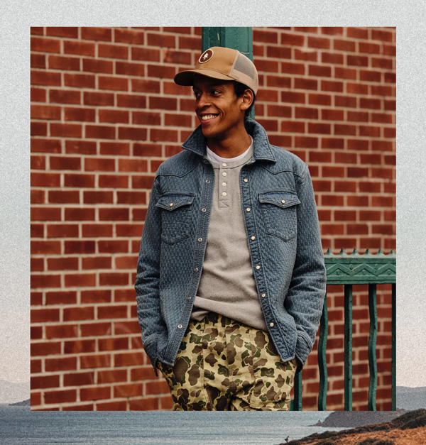 image of a blue quilted button up western shirt jacket