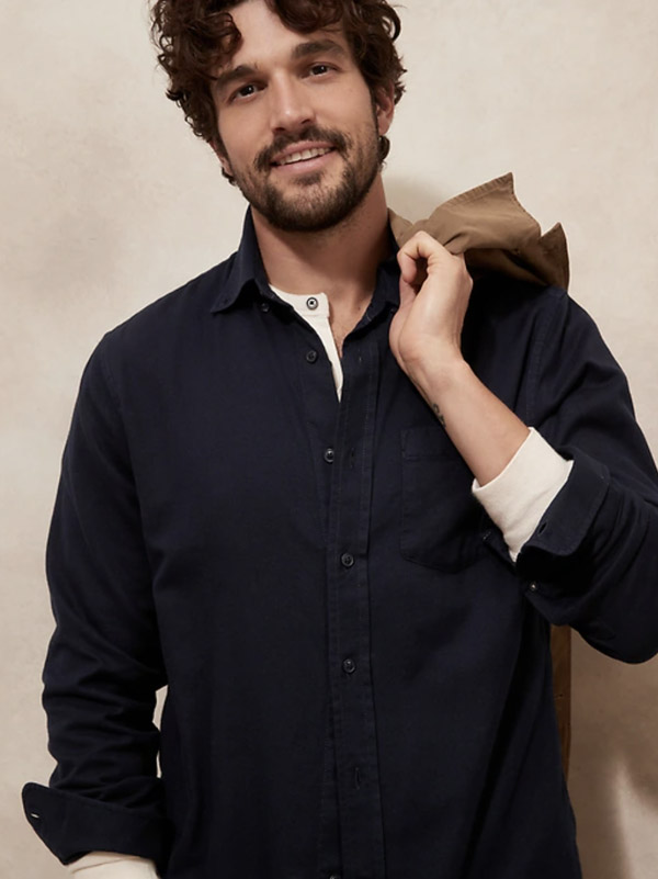 image of a man wearing a navy blue flannel long sleeve shirt