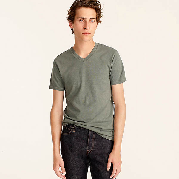 image of a man wearing a green garment dyed shirt