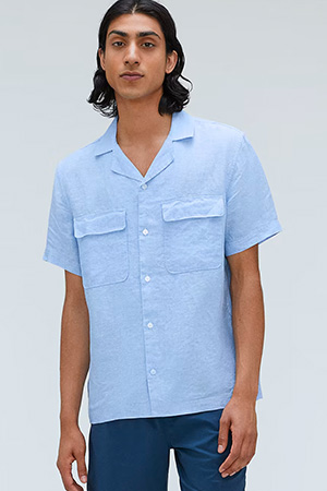 image of a person wearing a blue short sleeve button down shirt