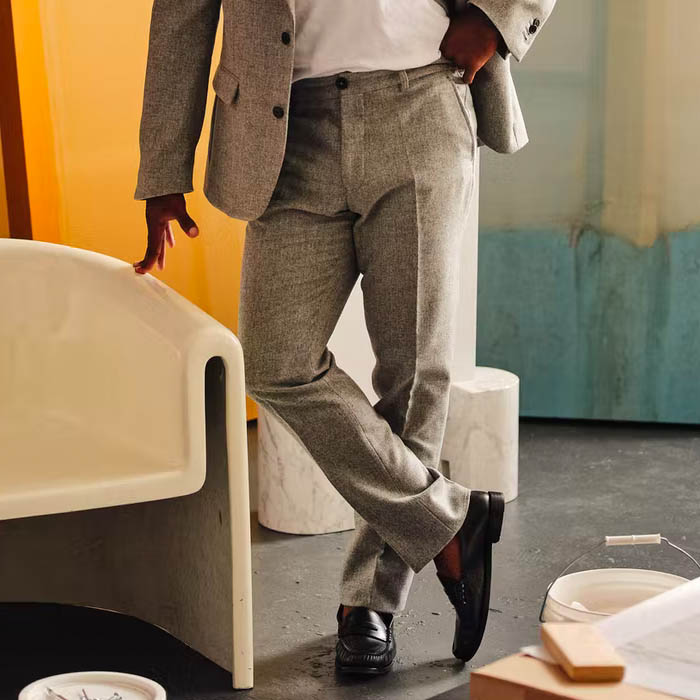 image of a person wearing charcoal grey wool trousers