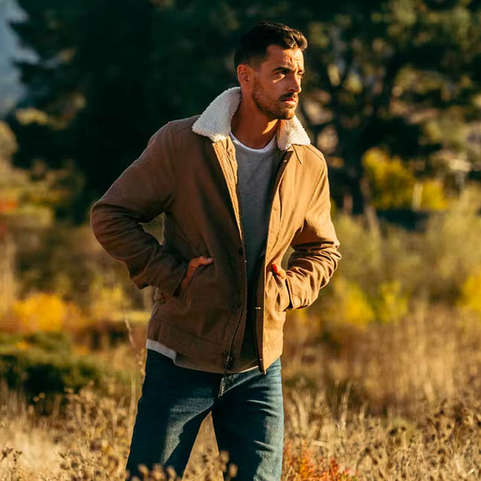 image of a man wearing a military olive sherpa jacket