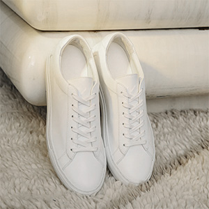 image of white leather sneakers