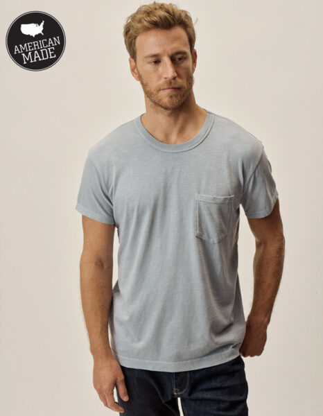 image of a man wearing a grey shirt