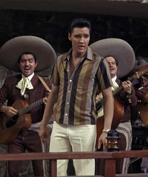 image of elvis presley wearing a striped button down shirt