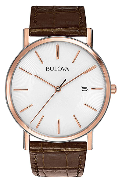 image of a watch with rose gold details and brown leather strap