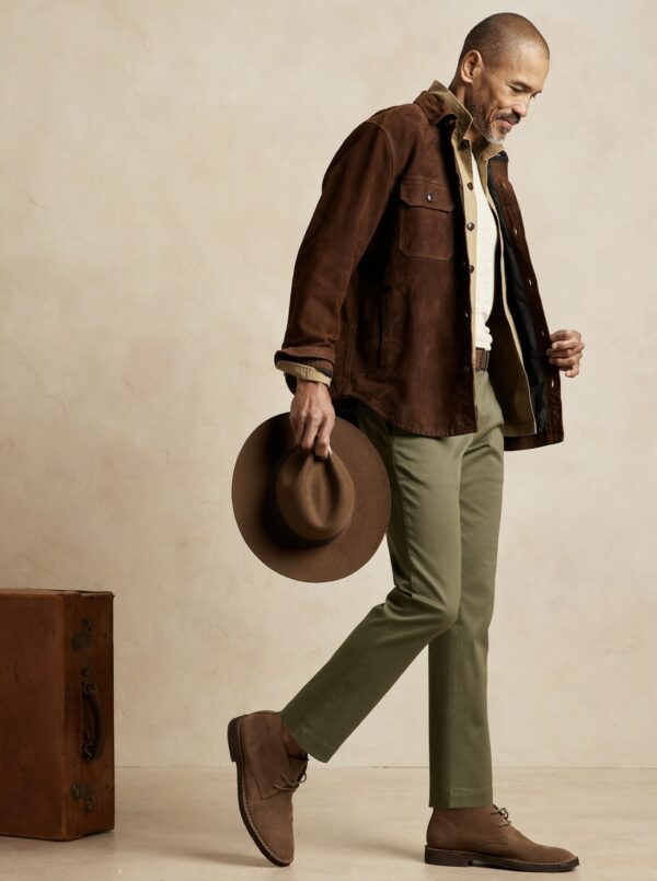 image of a man wearing green slim chino pants