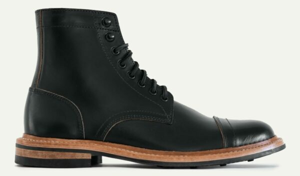 image of a black cap toe boot