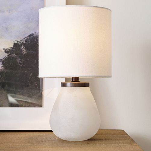 glass table lamp on a table