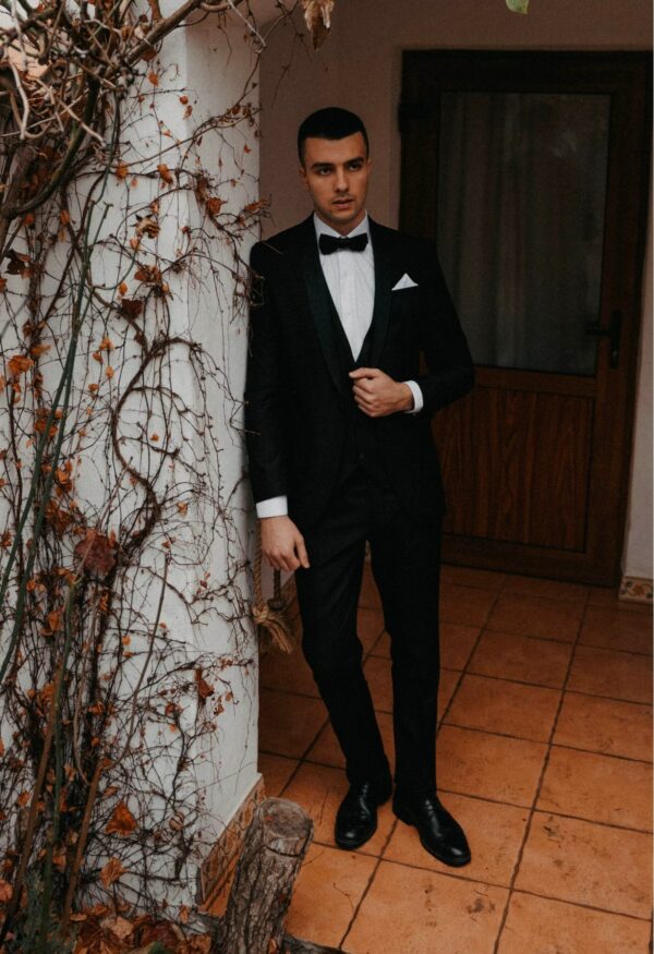 image of a man wearing a tuxedo and bow tie