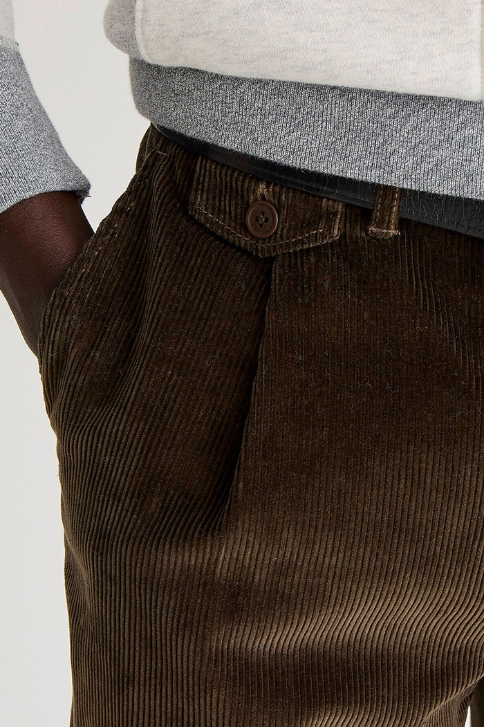 close up of pleat on pleated corduroy pants
