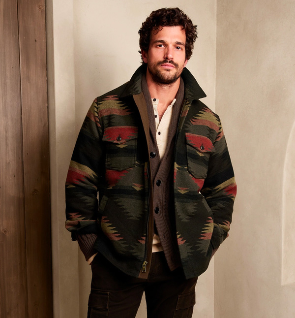 man wearing brown geometric jacket